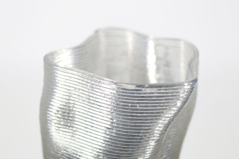 Tumult sustainable vase from recycled plastic transparent 3D-printer close-up